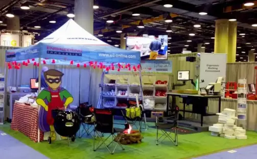 Trade show booth featuring a tent labeled 