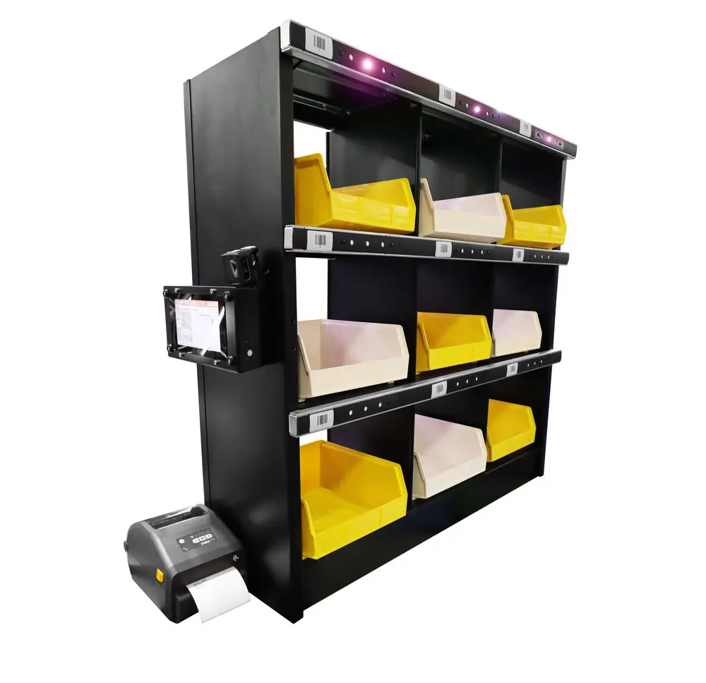 Black shelving unit with three levels of storage, each containing yellow and white bins. A small label printer is attached to the side.